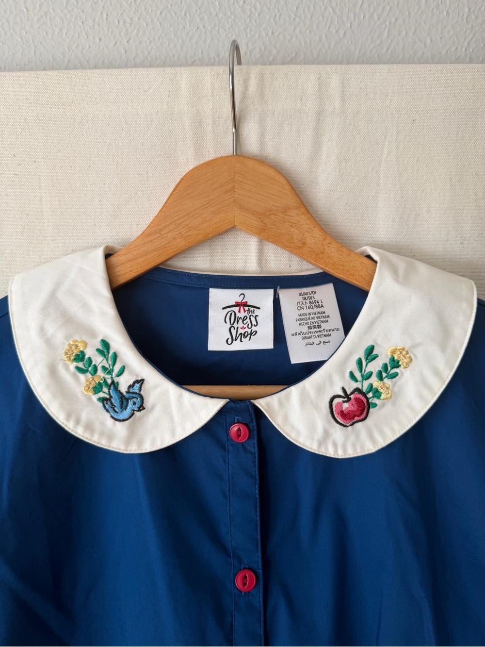 Snow White Navy Peplum Top with White Embroidered Collar & Beige Wide-Leg Pants - Picture 8 of 9